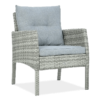 szary fotel pokryty plecionką z technorattanu CORTINA z poduchami