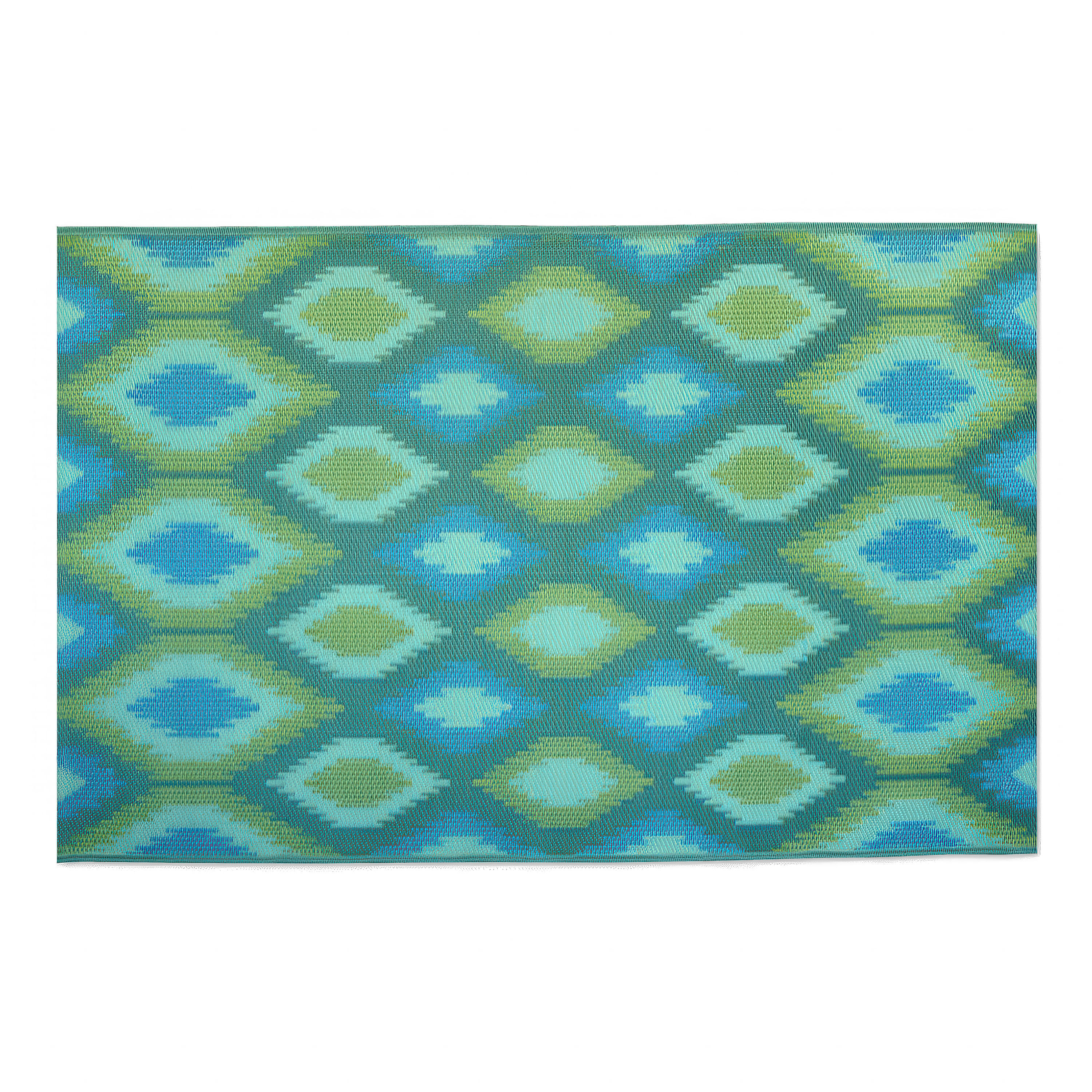 Kolorowy dywan ogrodowy w geometryczny wzór rombów w odcieniach zieleni i błękitu, widok z góry.