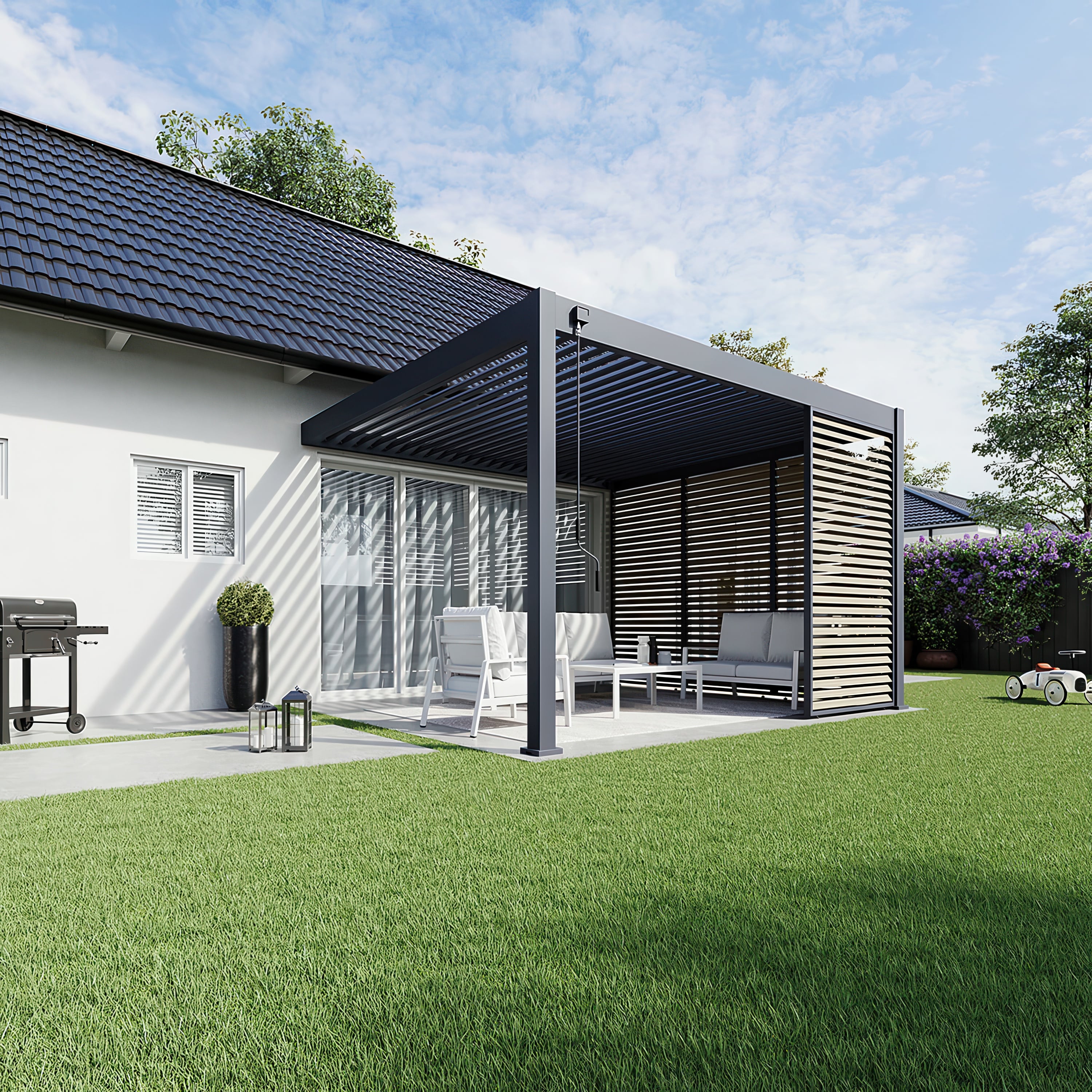 Pergola Deluxe Wall 3.6x4 antracytowa na tarasie w ogrodzie, widziana z dystansu.