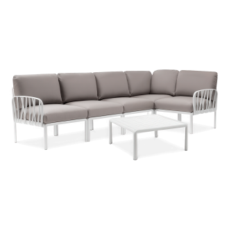 biały modułowy narożnik ogrodowy z poduchami i stołem w zestawie