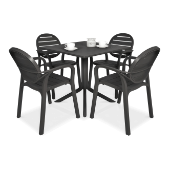 cztery krzesła i stolik w kolorze czarnym