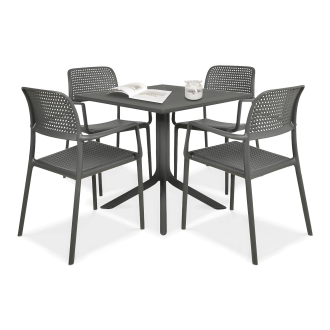 zestaw czarnych mebli jadalnianych z czterema krzesłami i stolikiem