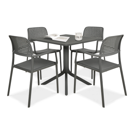 zestaw czarnych mebli jadalnianych z czterema krzesłami i stolikiem