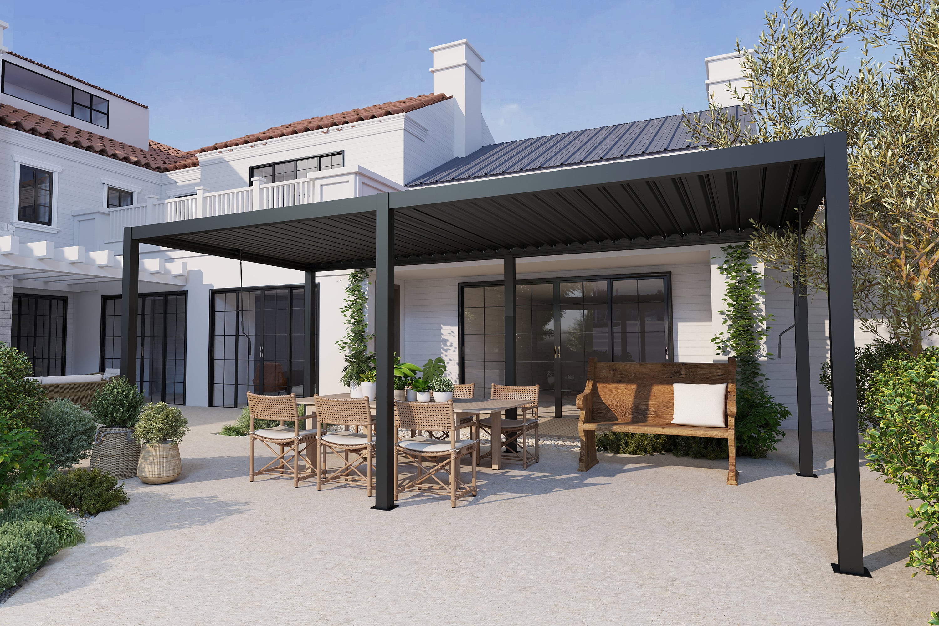 Nowoczesna pergola aluminiowa na tarasie przy domu z meblami ogrodowymi w słoneczny dzień