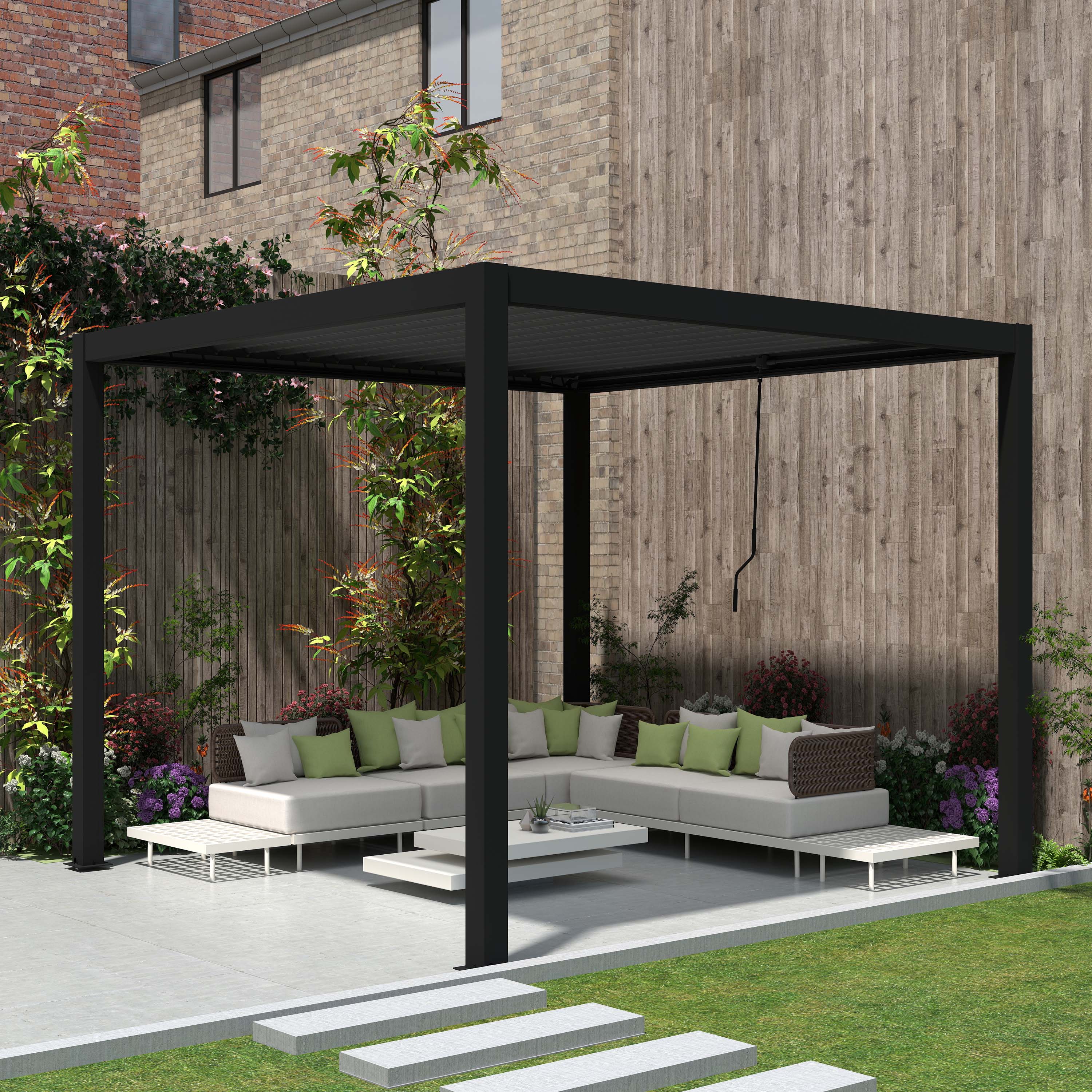 Pergola tarasowa 3x3 PRIMARY Anthracite Gutroof w aranżacji ogrodowej z narożnikiem wypoczynkowym na tle ceglanego budynku