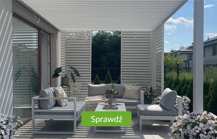 Pergola ogrodowa Gutroof na tarasie a pod nią zestaw mebli ogrodowych 