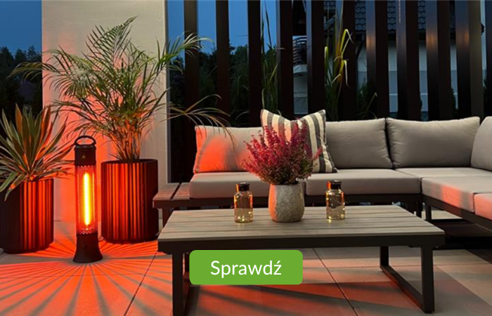 Promiennik kolumnowy, kt&oacute;ry oświetla ciepłym światłem pomieszczenie tarasowe oraz zestaw mebli